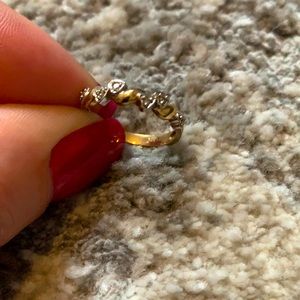 Gold promise ring with diamonds.